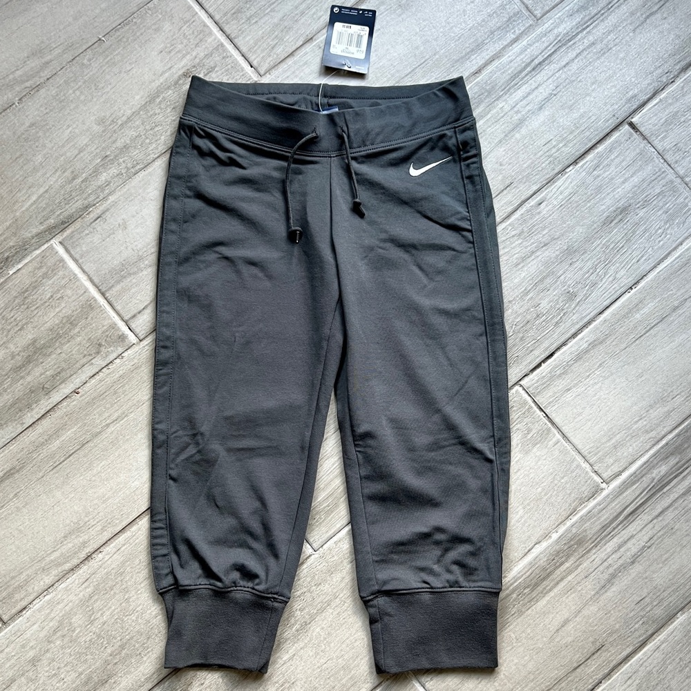 Nike capri workout pants with knit cuffs in charcoal grey NWT